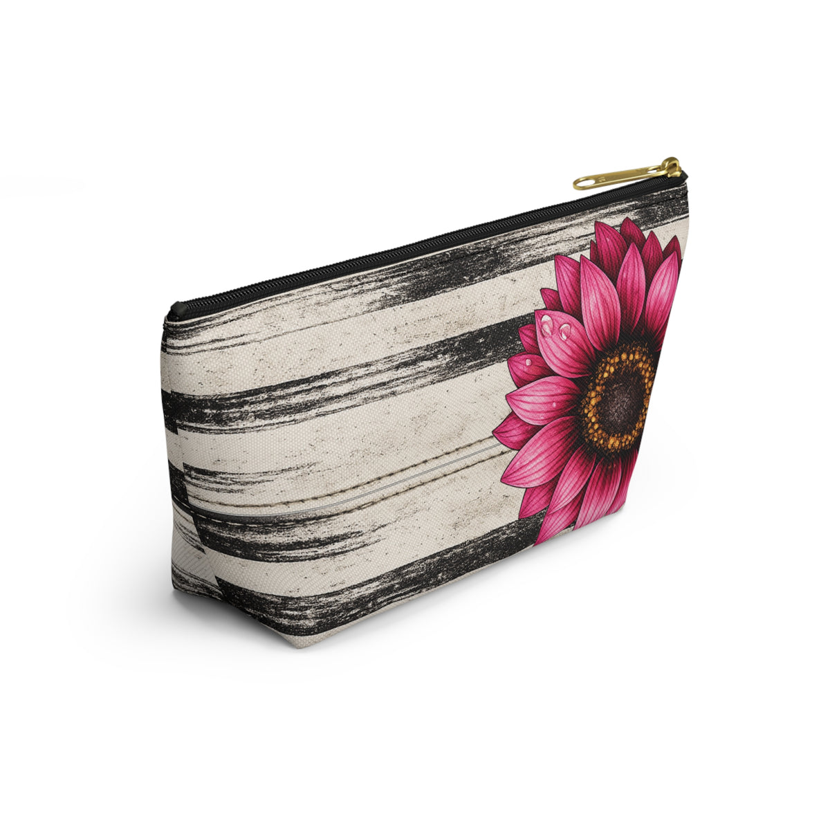 Angled product view of the Boho Sunflower Makeup Bag with black-and-beige vintage stripes, large pink sunflower artwork, gold zipper pull, and upright T-bottom shape.